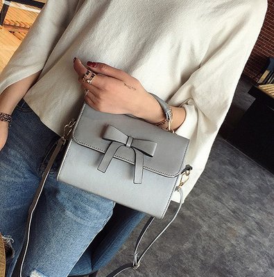 Стильная женская сумочка с бантиком Серый 434 фото